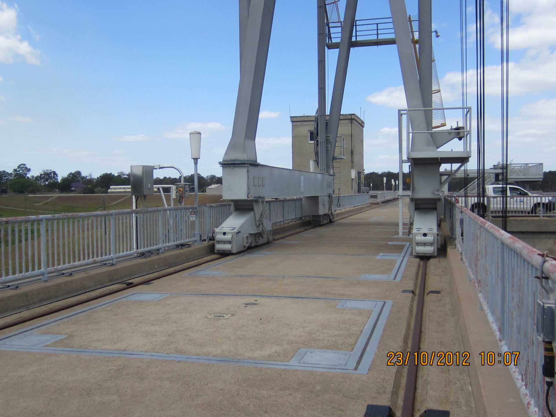 Bridge over the radial gates and one of the local control cubicles